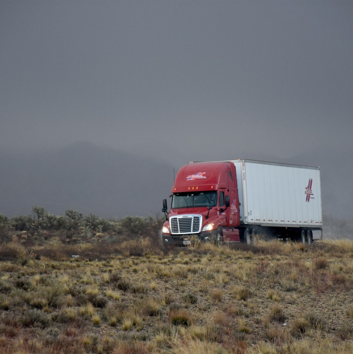 semi truck highway sunrise